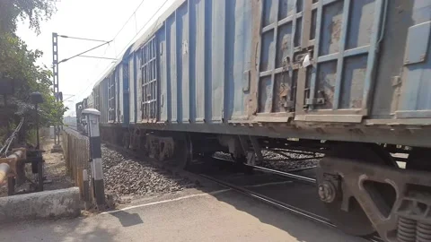 Super Fast Passenger Train passing From Railway Station, India Stock Footage 200846931