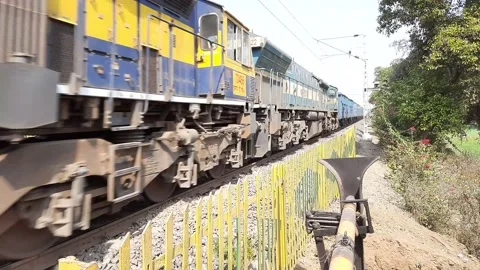 Super Fast Passenger Train passing From Railway Station, India Stock Footage 200850174