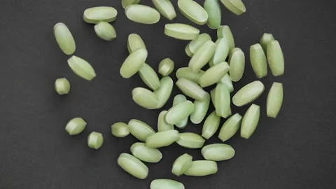 Super food capsules moringa rotating top view. Spirulina Stock Footage 159484093