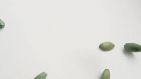 Super food moringa capsules rotating top view. Spirulina, chlorella capsules. Stock Footage 159481832
