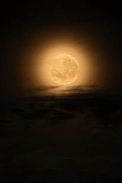 Super Full Moon setting Stock Photos