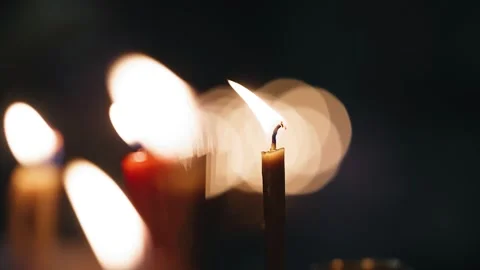 A super-large plan of burning candles in the temple during the Easter service Stock Footage 278411095