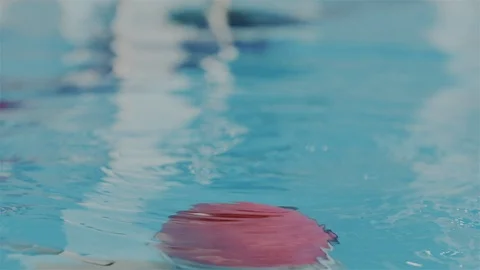Super macro portrait in slow motion. Face of young professional swimmer woman in Stock Footage 112066480