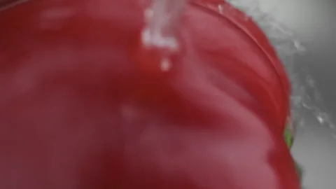Super Macro of Red Sweet Pepper under Water Stream or Shower, Drops of Water Run Stock Footage 273131395