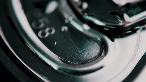 Super macro shooting of a beer can. I open a can of beer and release the gas . Stock Footage 137858648