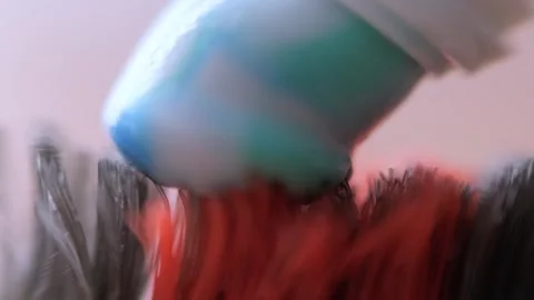Super macro squeeze toothpaste onto toothbrush, Health care, dental hygiene Stock Footage 246143441