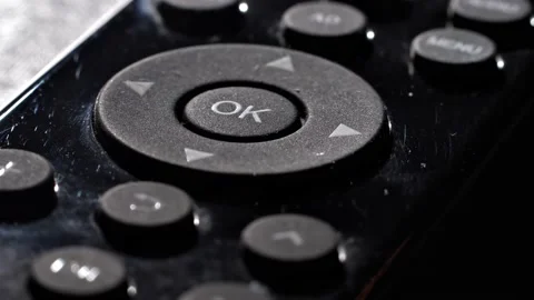 Super macro of television buttons on the TV remote control Stock Footage 217375548