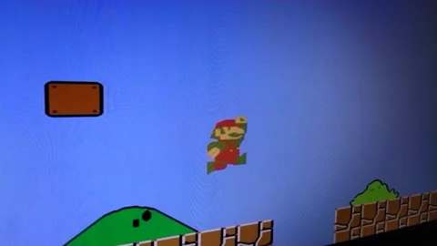 Super mario arcade game. indoor super mario arcade video games 스톡 동영상 196399509