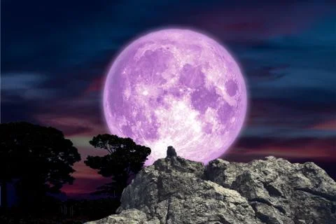 Super moon back over monster on stone and rock of cliff Stock Photos