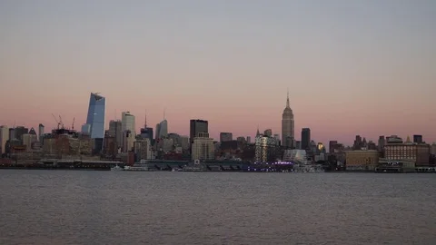The Super Moon rising behind the Empire State Building​ at Sunset Stock Footage 69715085