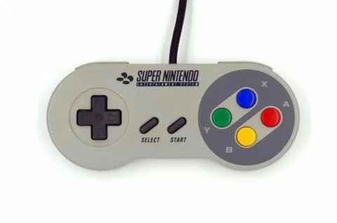 Super Nintendo (SNES) game controller. Stock Photos
