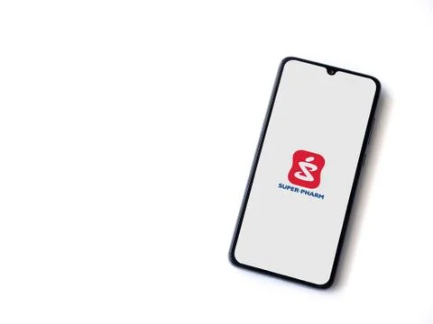 Super Pharm app launch screen with logo on the display of a black mobile smar Foto stock