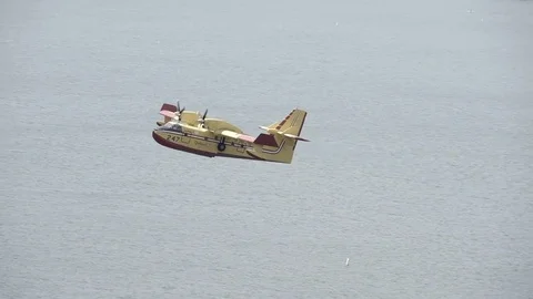 Super scooper good close-up fly-by in slow motion Stock Footage 79862177