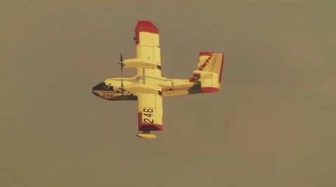 Super Scooper plane flying through sky 3 Stock Footage 54642013