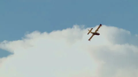 Super Scooper plane flying through sky Video stock 54642357