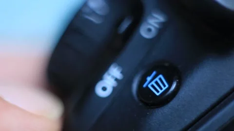 Super shallow depth of field shot from a  man pressing a on/off switch in a digi Vídeo Stock 234722816