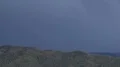 super slo mo extreme large branching lightning strike in mountains day Video HD