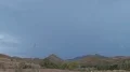 super slomo powerful lightning in the distant desert day time storm HD動画