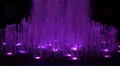 super slomo vertical water jet display fountain bubbles purple HD Footage
