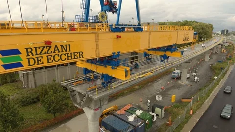 Super slow drone shot approaching special horizontal crane for REM construction Stock Footage 117841356