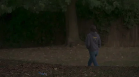 Super Slow Mo: Autumn Walking Girl &amp; Rubbish HD Stock Footage 42943114