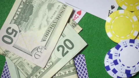 Super slow mo banknotes fall on the gaming table casino Video stock 72340584