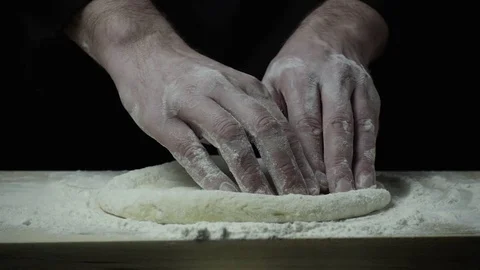 Super slow mo chef stretches the dough Stock Footage 72782415
