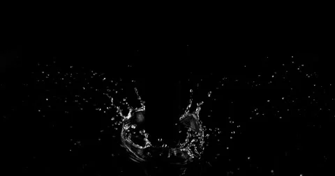 Super slow motion (1000 fps) crown splash of water with hollow black center Stock Footage 332786993