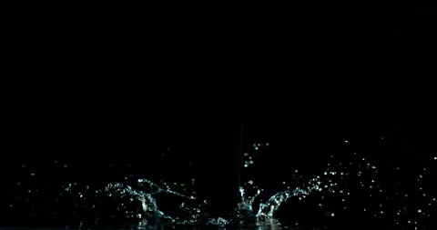 Super slow motion (1000 fps) crown splash of water with hollow black center Stock Footage 332786999