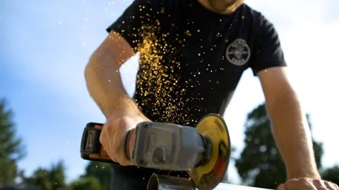 SUPER Slow Motion 2,277fps Circular Grinding Steel Pipe with Sparks Spraying Stock Footage 312341123