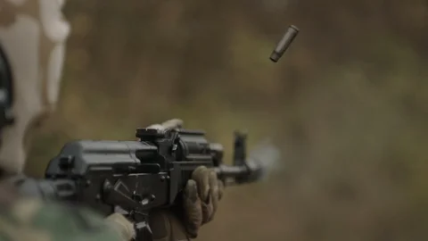 Super slow motion 2K. Sports shooting. Shot from Kalashnikov assault rifle. Stock Footage