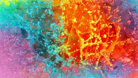 Super slow motion of abstract colored splashes explosions filmed from top. Stock Footage 138015904