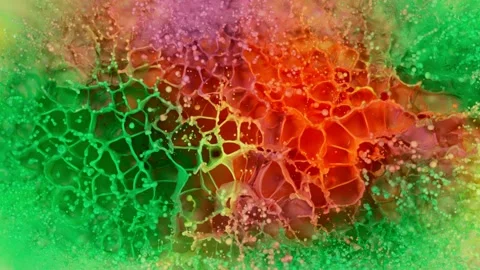 Super slow motion of abstract colored splashes explosions filmed from top. Stock Footage 138040405