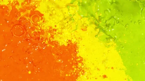 Super slow motion of abstract colored splashes explosions filmed from top. Stock Footage 138041982