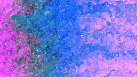 Super slow motion of abstract colored splashes explosions filmed from top. Stock Footage 138042926