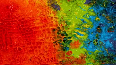Super slow motion of abstract colored splashes explosions filmed from top. Stock Footage 138044008