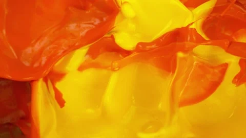 Super slow motion of abstract colored splashes filmed from top. Stock Footage 141576562