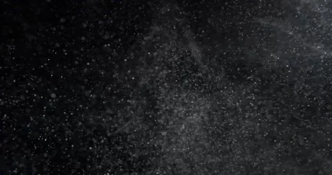 Super slow motion abstract particles on black background. Filmed with RED camera Stock Footage 223481023