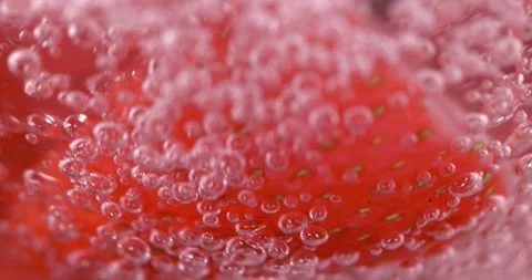 Super Slow Motion Advertiser Capturing Strawberry Fizz  Stock Footage 334079565