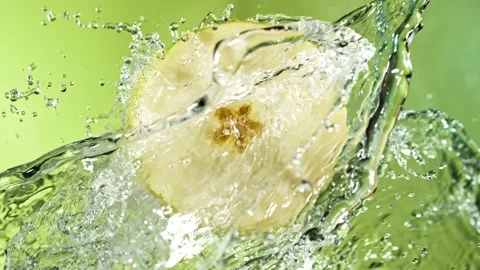 Super Slow Motion of Apple Slice With Water Splashes. Stock Footage 201190149