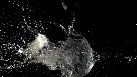 Super slow motion ball bursts with splashes of water. 動画素材 162938608