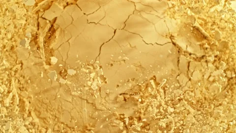 Super slow motion of beige makeup powder explosion, rotating. Stock Footage 239635948