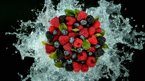Super slow motion of berries fruit with splashing water. Stock Footage 223673079