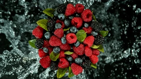 Super slow motion of berries with splash water, black background Stock Footage 231986291