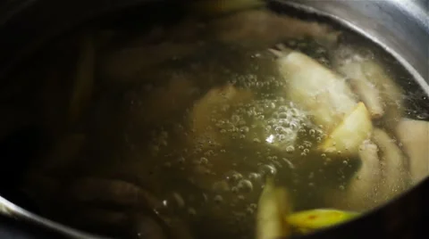 Super slow motion of boiling Thai soup in a pot Stock Footage 65858680