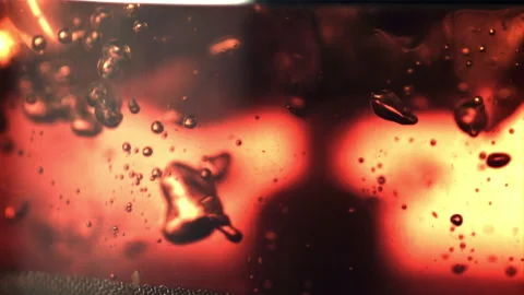 Super slow motion brewing black tea with air bubbles. Filmed on a high-speed Stock Footage 156441466