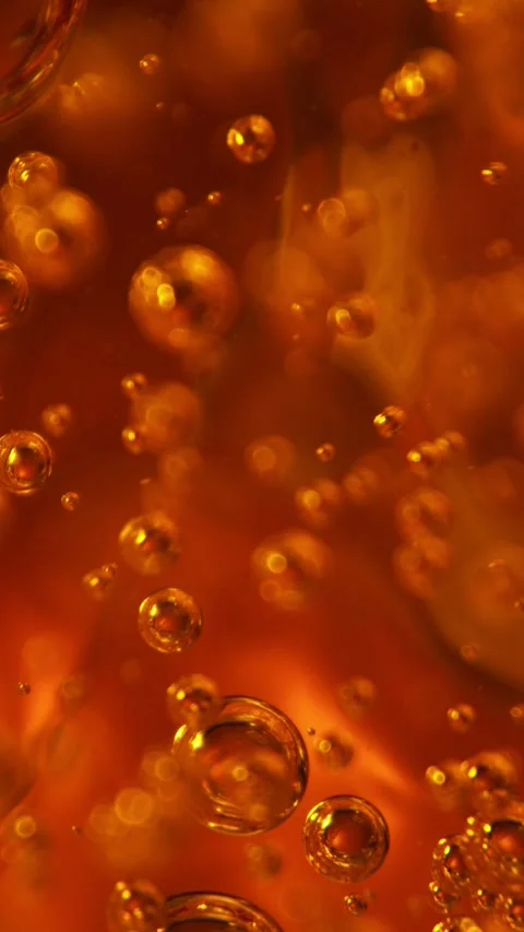 Super Slow Motion of Bubbling Golden Liquid in Detail. Stock Footage 289002463