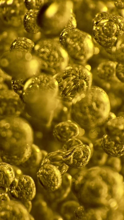 Super Slow Motion of Bubbling Golden Liquid in Detail. Stock Footage 289007522