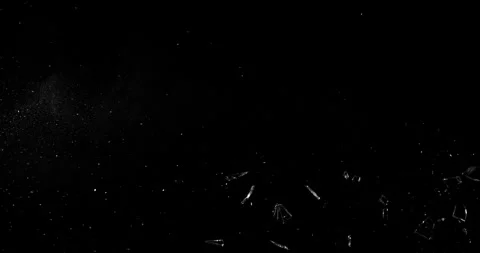 Super slow motion bullet impact shattering glass filmed at 1000fps. Stock Footage 326893681