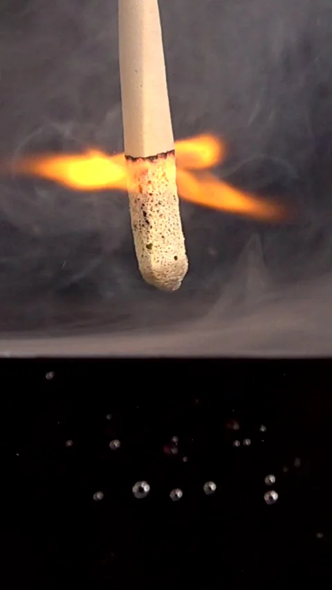 Super Slow Motion Captures Candle Flames Interacting With Water Drops at 1000 Stock Footage 321951005
